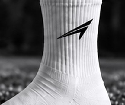 White ACE sock on the pitch